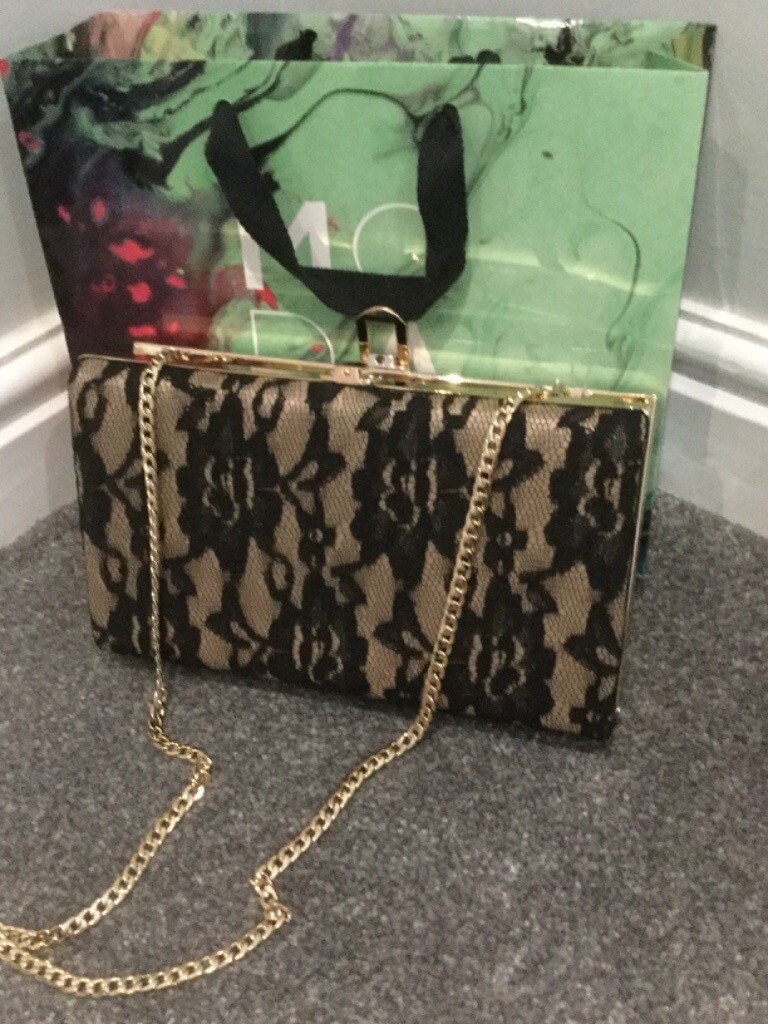 moda in pelle clutch bag